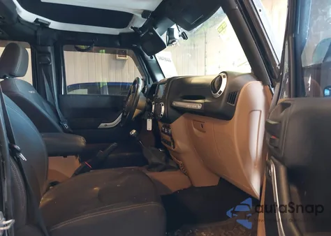 2014 Jeep Wrangler Unlimited Rubicon z USA, uszkodzony, nr VIN 1C4HJWFG8EL138155